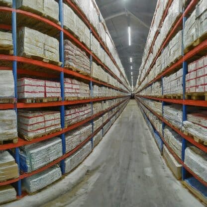 A close-up of a warehouse racking system with various accessories